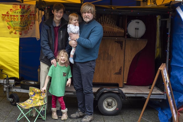 Mark Raven, from Bourne with son William, granddaughters Malia and Evelyn and his organ Lady Pauline. Photo: HOLLY PARKINSON
