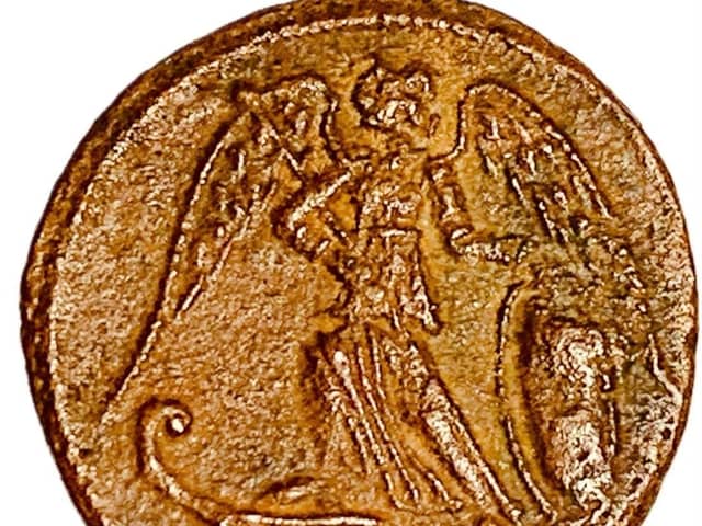 A Roman coin of Emperor Constantine showing a winged victory, from which the early Christian imagery of Angels is derived.