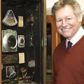 James Laverack with the rare 1931 ‘Green Ray Television’ mind reading machine, which sold for £4,500. Image: John Taylors