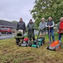 Residents in their eighties who are cuttng grass, supported by Coun Steve O'Dare (second right).