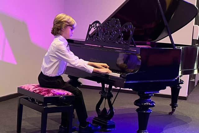 Elijah performing at the Embassy Theatre in Skegness.