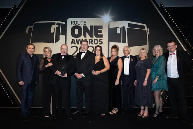 A & P Travel Tours win at the Routeone awards for the bus and coach industry, pictured with presenters Ardal O'Hanlon, Helen Conway and Tim Deakin.