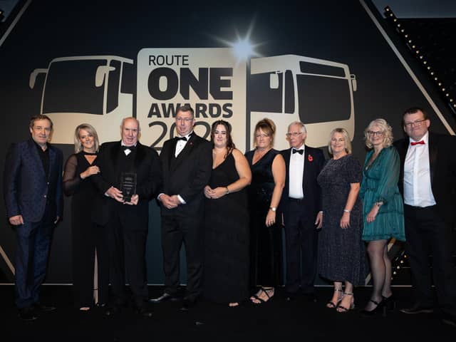 A & P Travel Tours win at the Routeone awards for the bus and coach industry, pictured with presenters Ardal O'Hanlon, Helen Conway and Tim Deakin.