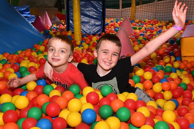 Jase Ride and Tommy Ride having fun in Just Jump's Ball Pool.