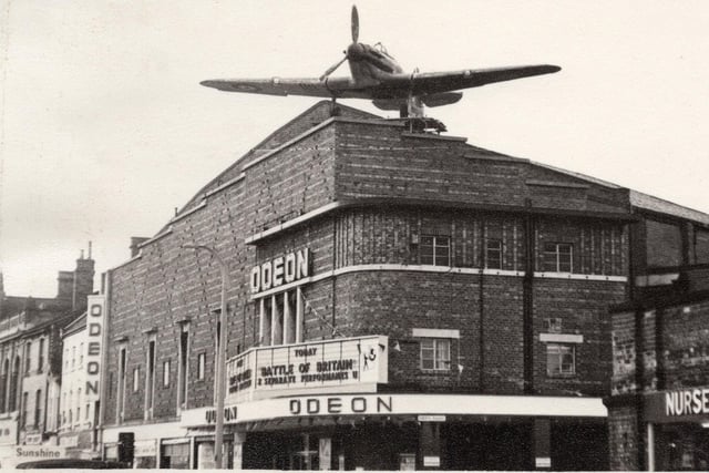 A snapshot of the replica aircraft on top of the roof of the Odeon Cinema in Lincoln in 1969.