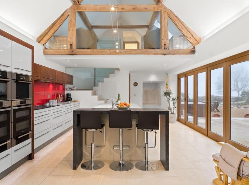 The kitchen with snug above, just off the principal bedroom.