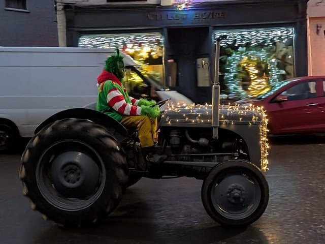 The Grinch driving a tractor in the Santa parade! Photo: Jean Shutt