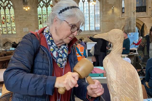 A wood carver in action at last years' event