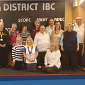 Les and Joyce Pert, volunteers for the Lincs & Notts Air Ambulance with members of Horncastle & District Indoor Bowls Club.