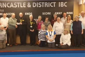 Les and Joyce Pert, volunteers for the Lincs & Notts Air Ambulance with members of Horncastle & District Indoor Bowls Club.