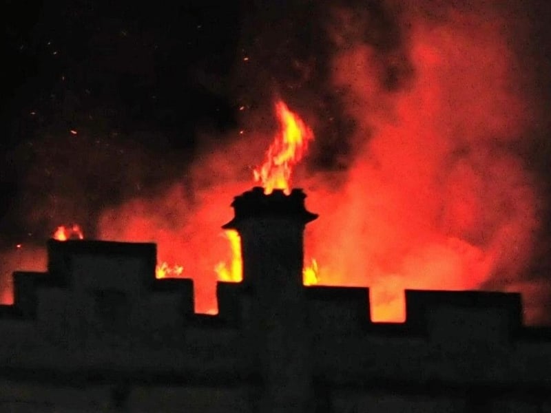 Flames rise up from the roof of the burning Sessions House om Sleaford Market Place. Photo: Roderick Carlyle