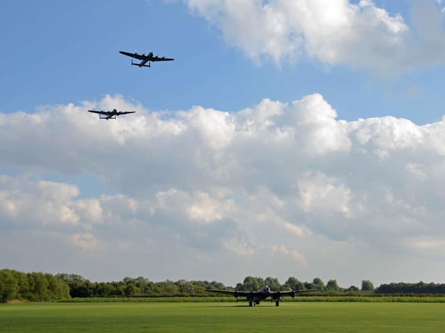 The only two airworthy Lancaster bombers in the world with the grounded Just Jane, of the Lincolnshire Aviation Heritage Centre, East Kirkby. A sell-out crowd of 5,000-strong watched the spectacle.