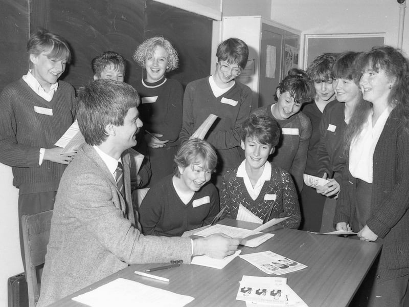 The event was sponsored by Midland Bank. Pictured with pupils is schools liaison officer Mick Houlden