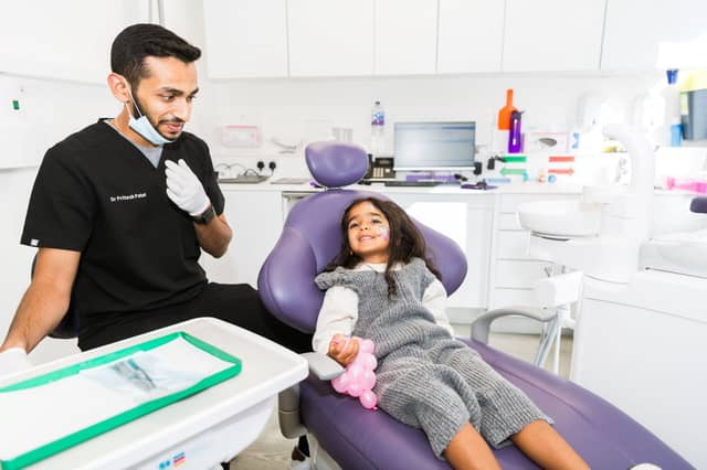 Child having a check up at a Magic Dentist Fun Day