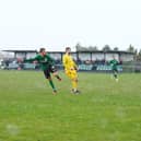 Joe Smith fires home Sleaford's second goal in the rain on Saturday. Photo: Steve W Davies Photography.