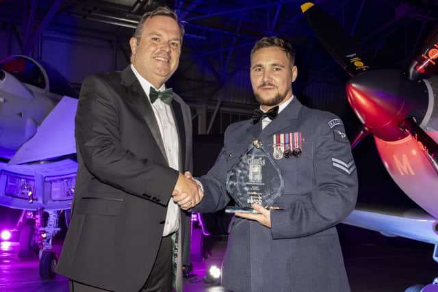 Corporal Luke Carter is presented with the strength in adversity accolade. (PHOTO BY: Sgt Nicholas Egan/RAF)