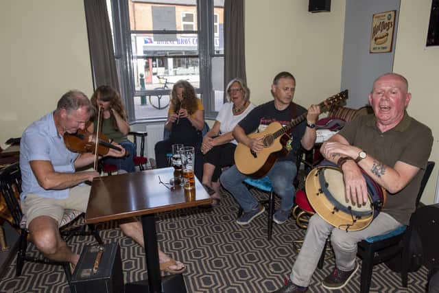 Musicians having a sing around in the bar on Sunday afternoon. Photo: Holly Parkinson