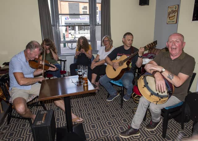 Musicians having a sing around in the bar on Sunday afternoon. Photo: Holly Parkinson