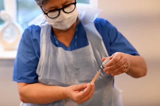 A second large Covid-19 vaccination centre is now open in Lincolnshire (Photo by OLI SCARFF/AFP via Getty Images)