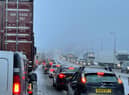 Traffic at a standstill on the M62 motorway near Kirklees, West Yorkshire, due to heavy snow in the area. (Photo credit: PA Wire)