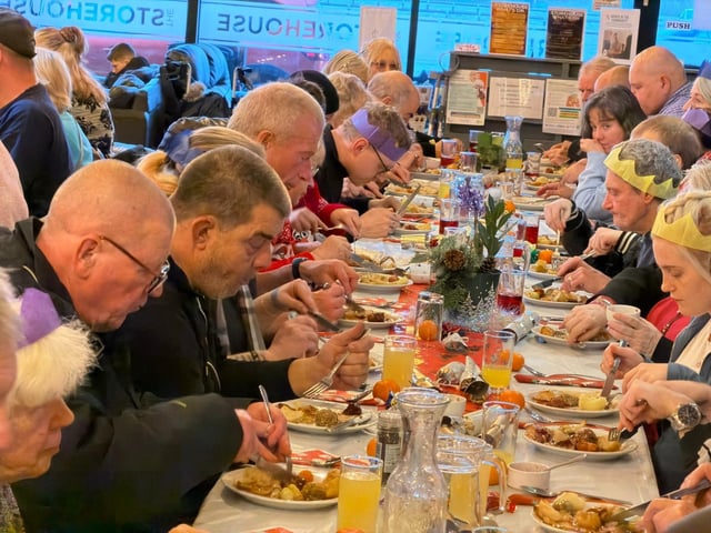 Guests enjoying the meal.