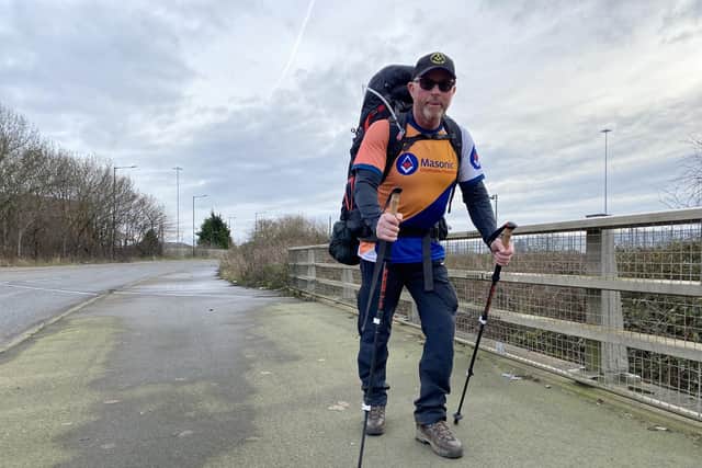 Chris Jones on his 7,000 walk, pictured just outside Grimsby. Photo: Chris Frear