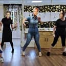 'Spice Girls' lookalikes perform at the care home.