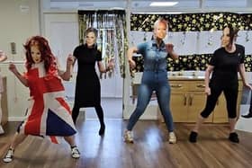 'Spice Girls' lookalikes perform at the care home.