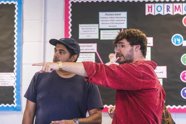 Giving direction to the cast and crew at the school. Photo: Morgan Christian
