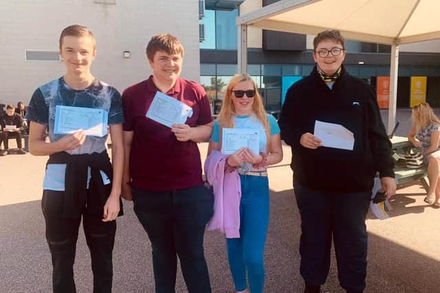 Students at The Gainsborough Academy with their GCSE results