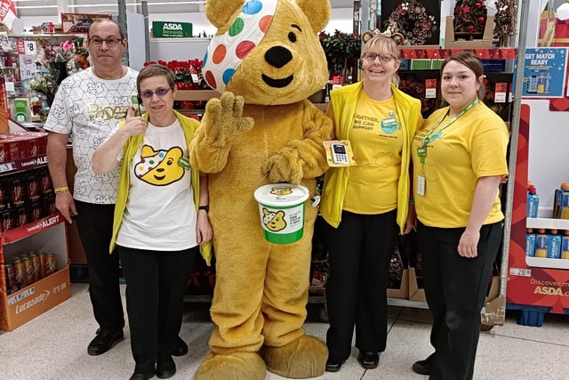 Pudsey Bear with staff at Asda Boston - Shane Parker, Rosie Cutting, Pudsey, Dianne Houghton, and Roxy Hall.
