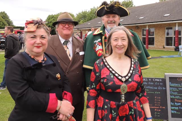 All set for the period costume contest at Sleaford's 1940s Day, Mayor Coun Linda Edwards-Shea and Town Crier John Griffiths with Deborah Tyler-Bennett and Martyn Bennett.