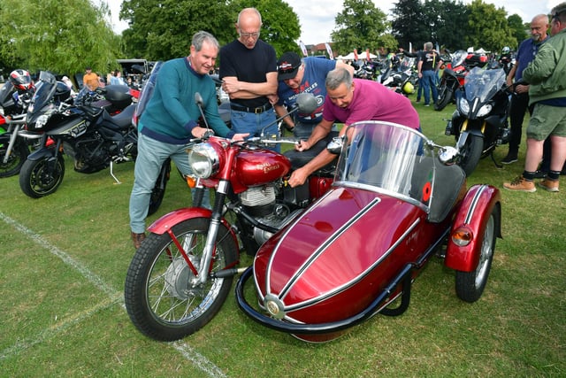 Pictured (from left) Brian Johnson, Pete Coupland, Trevor Woodman and Gilly Gilbert, of Wyberton, with his 2004 Royal Enfield 500 Bullet.