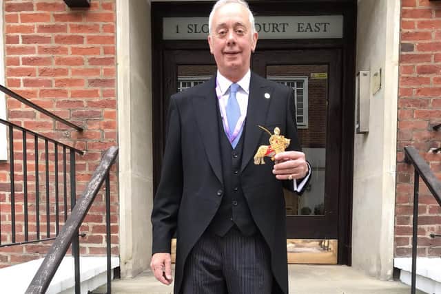 Francis Dymoke dressed ready for King Charles III's Coronation.