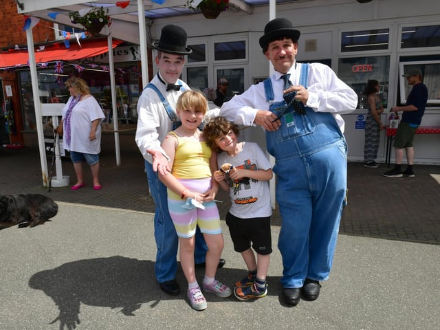 Laurel and Hardy lookalikes Gary Slade and Rob Graham with Hannah Yates 9 and Joshua Yates 7 of Chapel st Leonards