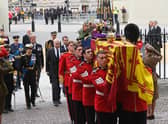Members of the Royal Family walk behind the coffin of Queen Elizabeth II outside Westminster Abbey (Picture: Geoff Pugh/pool via AP)