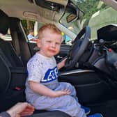Lincoln Packer, 2, from Kirkby in Ashfield got the opportunity to sit in a police car seconds before this emergency service was called away to an incident.