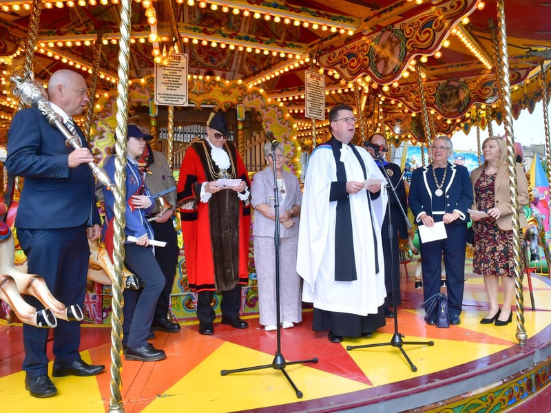 The official opening of this year's May Fair from the golden gallopers.