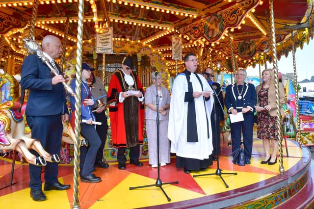 The official opening of this year's May Fair from the golden gallopers.