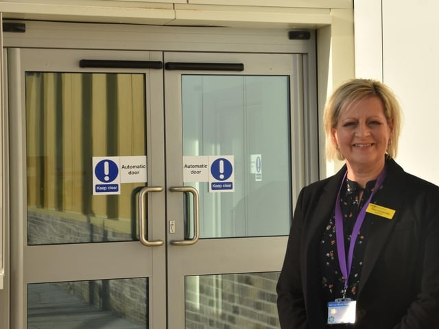 Professor Karen Dunderdale, Lincolnshire Community and Hospitals Group Chief Executive, at the centre.