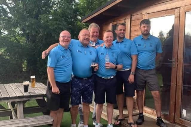 The team celebrate completing the Big Golf Race for Prostate Cancer UK.