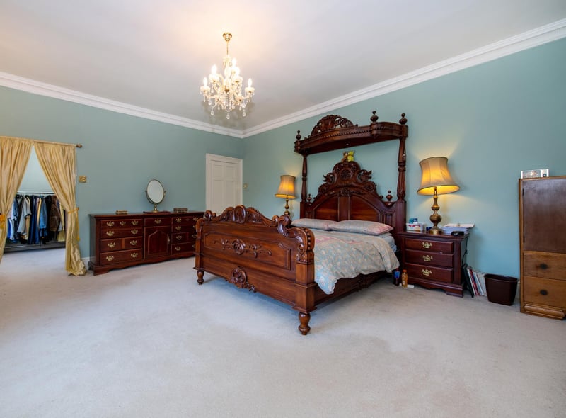 The master bedroom, with dressing room beyond.