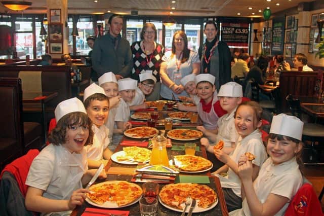 Members of Skegness Junior School’s cookery club are pictured at Little Frankie’s restaurant 10 years ago. Youngsters enjoyed a hands-on lesson in pizza-making and then got to eat the results.