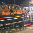 RNLI crews cleaning the lifeboat after returing safely following the rescue mission. Photo: Porsche Mckenzie