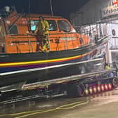 RNLI crews cleaning the lifeboat after returing safely following the rescue mission. Photo: Porsche Mckenzie