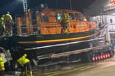 RNLI crews cleaning the lifeboat after returing safely following the rescue mission. Photo: Porsche Mckenzie