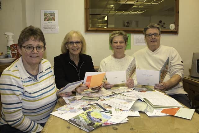 Sally, Jo, Maxine and Nick with some of the cards they've been sent. Image: Eddisons