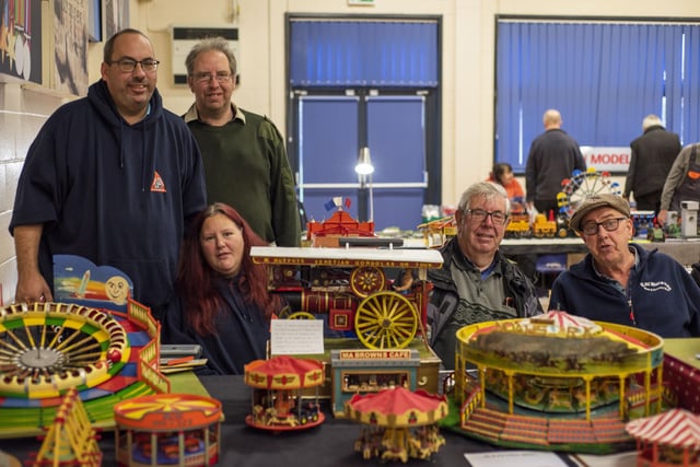 1/24 scale fairground models of Lincolnshire, with from left - Rob Horton, Nicky Blanchard, Daniel and Roy Mortimer and Mick Reynolds. Photo: HOLLY PARKINSON