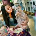 Emily with Lily at her fourth birthday party. Photo: Mick Fox