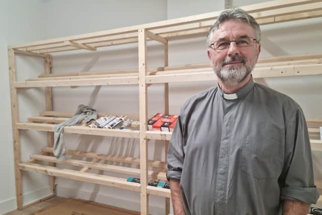 The Rev David Middleton in the extension to the Storehouse food bank in Skegness which is being built by the  asylum seekers.